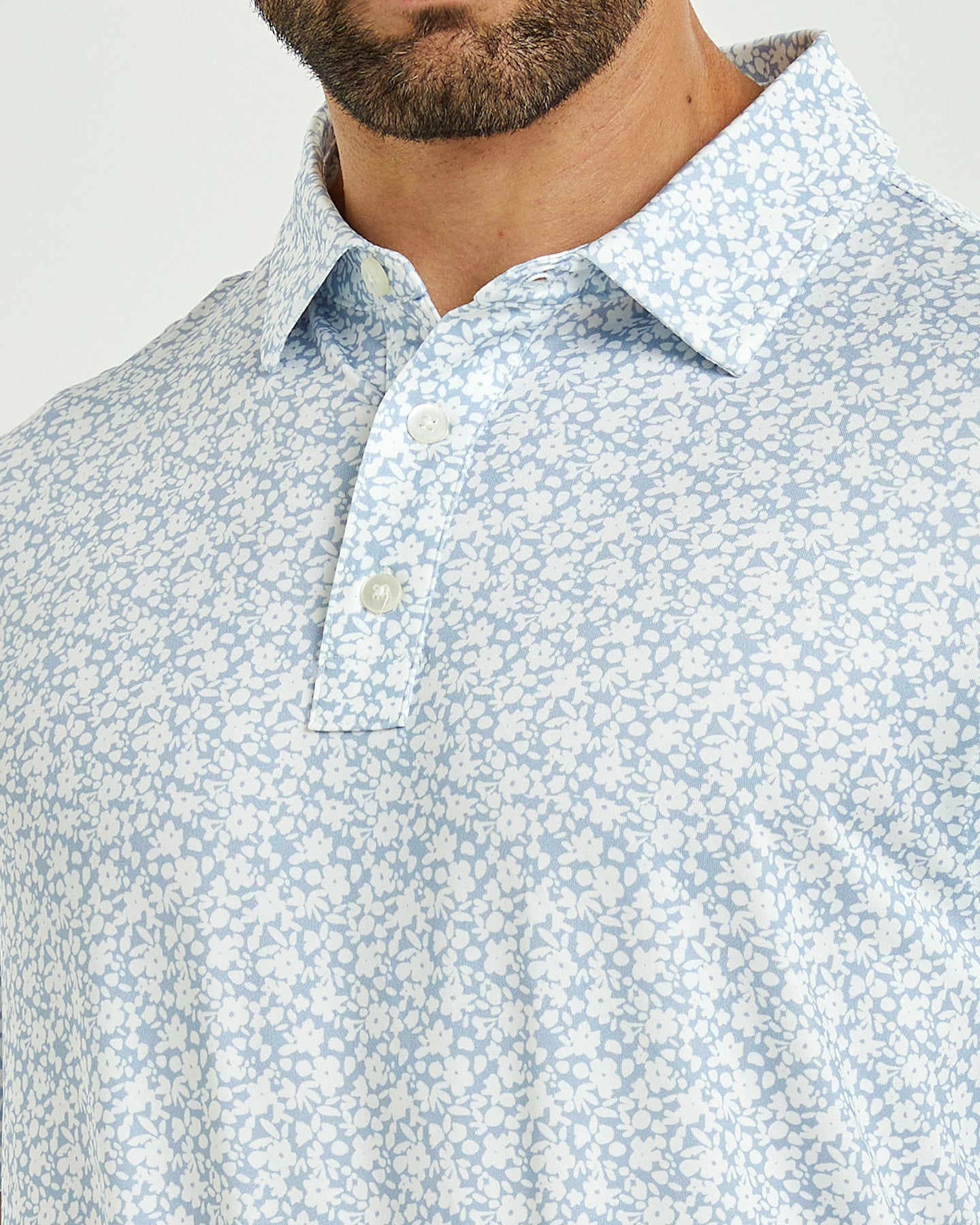 Men's golf polo shirt with white flower prints