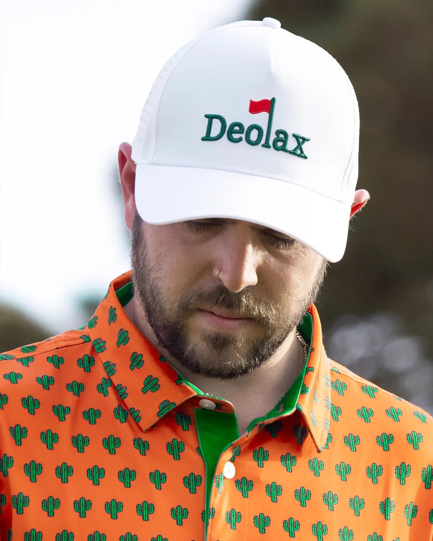 Men’s orange cactus print golf polo shirt